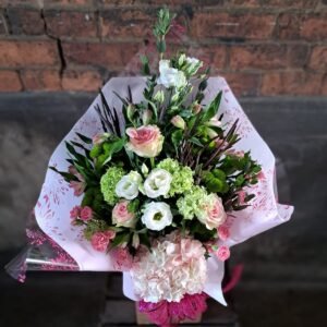 Front-Facing Floral Arrangement: A beautifully crafted box, with flowers in soothing cream and light hues, curated by Nottingham City Florist."